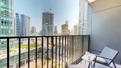 a balcony with a view of a city at Locations I Ahad Residences I Luxurious Studio Apartment I Business Bay I 10-Min Drive to Downtown Dubai & Burj Khalifa in Dubai
