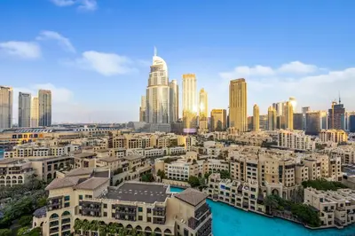 a view of a city skyline with skyscrapers at Durrani Homes - Lumina Grand 3BR with Burj khalifa and Fountain Views in Dubai