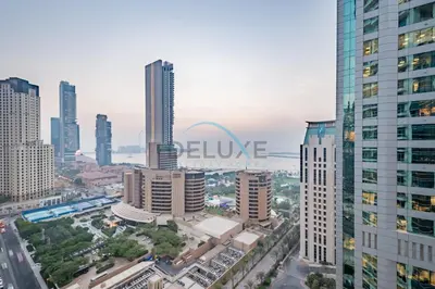 an aerial view of a city with tall buildings at Stunning 1BR Apartment at Botanica Tower 1, Dubai Marina by Deluxe Holiday Homes in Dubai