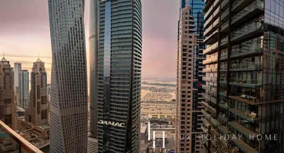 a view of a city skyline with tall buildings at LUX The Marina Gate Sea View Suite in Dubai