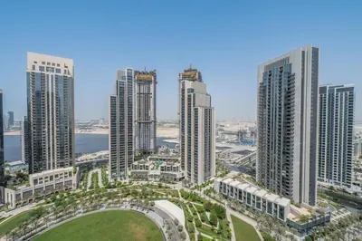 an aerial view of a city with tall buildings at Luxuswohnung in Creek Harbour in Dubai