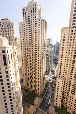 an aerial view of a city with tall buildings at Beautiful and bright 1 bedroom apartment! Sofia ! in Dubai