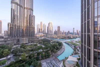 a view of a river in a city with tall buildings at Spacious 3 Bedroom Apartment in Downtown with Burj Khalifa view in Dubai