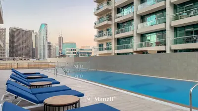 a swimming pool on the roof of a building at Lux 2BR Apartment Near Dubai Mall & Burj Khalifa in Dubai