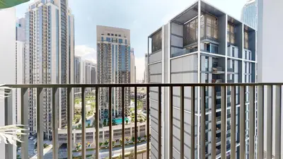 a view of a city with tall buildings at Creek Edge - Elegant One Bedroom in Creek Habour in Dubai