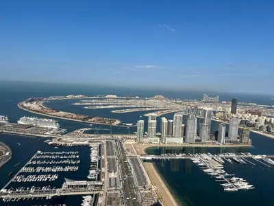 an aerial view of a city with a marina at Veer Apartments - 87th Floor Penthouse Full Sea View 5 BHK in Dubai