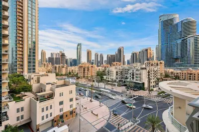 an aerial view of a city with tall buildings at Chic City Apartment in Dubai Gym, Pool, and Free Parking in Dubai