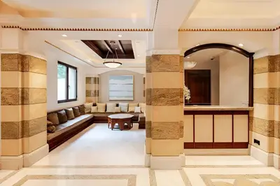 a living room with a couch and a table at 804 Yansoon 5 Amazing 1BR Apt Downtown Dubai in Dubai