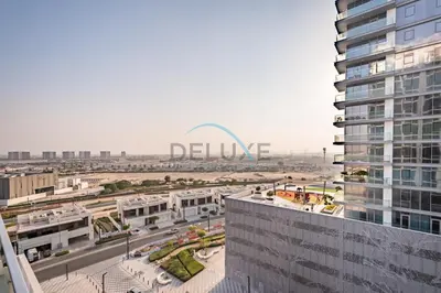 an aerial view of a city from a building at Stunning 1BR Apartment in District One Phase III, Mohammed Bin Rashid by Deluxe Holiday Homes Al Maktoum City in Dubai