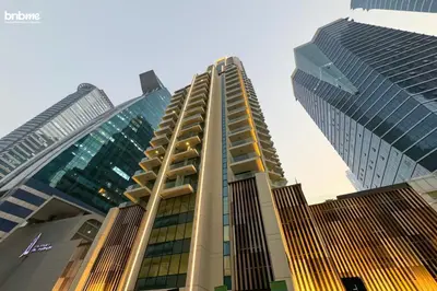 a group of tall buildings in a city at bnbmehomes - Urban Oasis by Missoni in Dubai