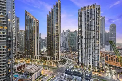 a city skyline with tall buildings and a street at FIRST CLASS 1BR Heart of Tranquility in Dubai