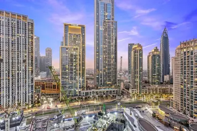 a city skyline with tall buildings and a street at FIRST CLASS 1BR Heart of Tranquility in Dubai