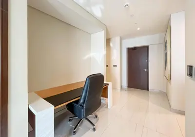 an office with a desk and a chair at Livbnb - 1B Palm Jumeirah and Sea View at Avani in Dubai