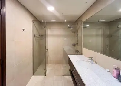 a bathroom with a shower and a sink at Livbnb - 1B Palm Jumeirah and Sea View at Avani in Dubai