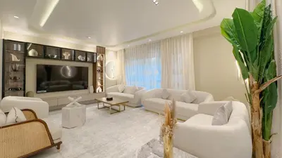 a living room with white furniture and a tv at Usmans 4 Bedroom Apartment on D Beach By SLS DIRECT BEACH ACCESS FULLY SERVICED JBR in Dubai
