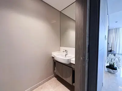 a bathroom with a sink and a mirror at Chic 1-Bedroom in Sterling Tower, Downtown Stay - 17AB05 in Dubai