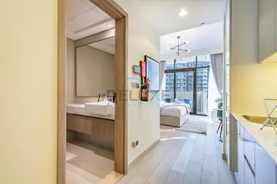 a bathroom with a sink and a mirror at Calming Studio Apartment at Azizi Riviera 4, Al Merkadh by Deluxe Holiday Homes in Dubai