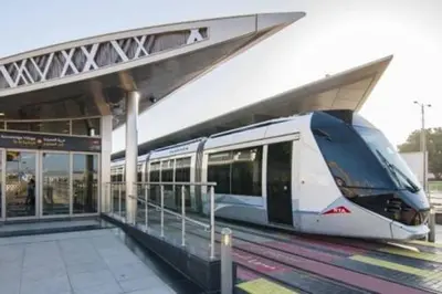 a train pulling into a train station at Luxury apartment in Dubai marina 5 min walk to JBR Beach-3BHK Apartment in Dubai