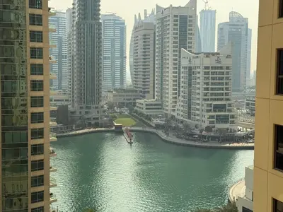 a view of a river in a city with tall buildings at Luxury 4 Bed apartment in Murjan, JBR in Dubai