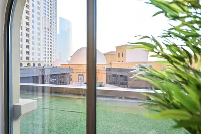 a view from a window with a view of a building at 7 Beds - JBR Beach 3 min walk in Dubai