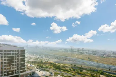 a view of a city from a building at First class 1BR Hall in Park Heights in Dubai