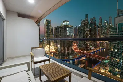 a balcony with a view of a city skyline at Perfect Stay - 1Bedroom with full Marina View in Dubai