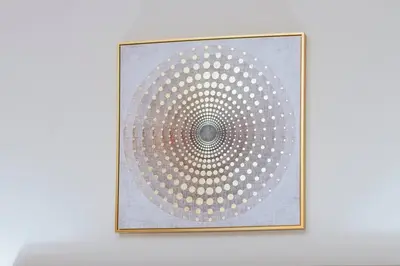 a picture of a mandala on a wall at Chic Studio Stay with Gym, Pool, and Kitchenette in Dubai