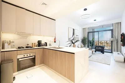a kitchen with a sink and a counter top at Legacy by Sunrise - Top Amenities and Paddle Court in Dubai
