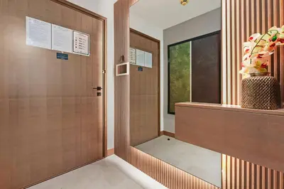 a hallway with a door and a window at FIRST CLASS 1BR Breathtaking Downtown View in Dubai