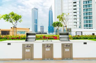 a counter with four pay phones in a city at Lux Escape, Burj Crown Opera View, Near Dubai Mall in Dubai