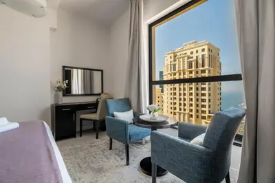 a hotel room with a view of a building at GuestReady - Contemporary stay in Dubai Marina in Dubai