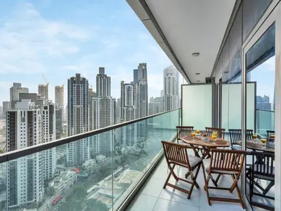 a dining room with a view of the city at Burj Khalifa Downtown Views - Highest Infinity Pool in Downtown in Dubai
