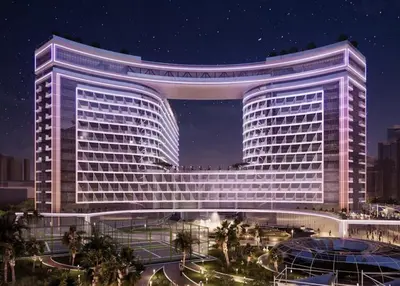 a rendering of a large building at night at Seven Palm Residences Palm Jumeirah by Happy Season in Dubai