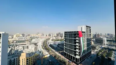 an aerial view of a city with tall buildings at Standard 1bedroom Apartment Binghatti Emerald JVC in Dubai