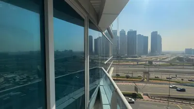 a view of a city from an office building at Dubai Marina- Cozy 2BHK Apartment in Dubai