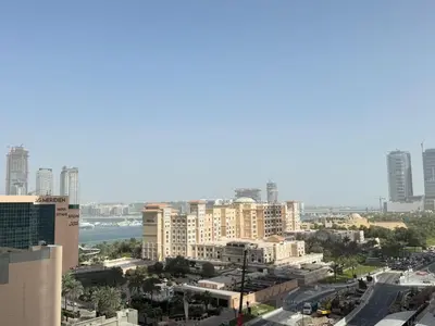 a view of a city with tall buildings at Marina Crown 1 BR Modern Apartment Full Sea View in Dubai