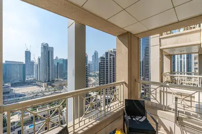 a balcony with a view of a city at Downtown Studio with Balcony at 29Blvd in Dubai