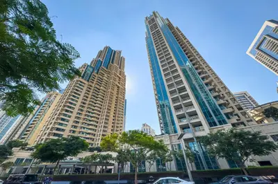 two tall buildings in a city with cars at Downtown Studio with Balcony at 29Blvd in Dubai