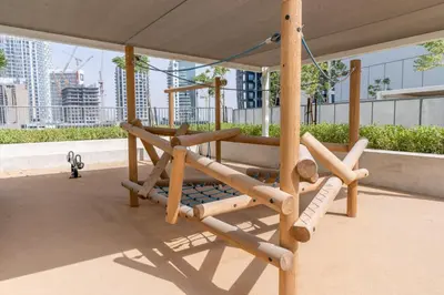 a swing on the roof of a building at GuestReady - Charming home in Business Bay in Dubai