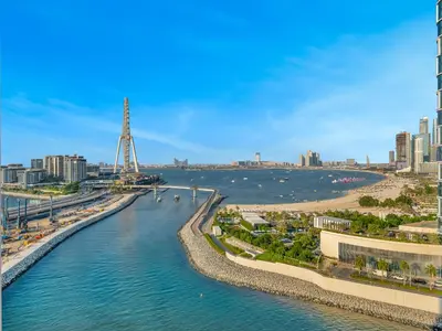 an aerial view of a river with a city at Brand New! Dubai Eye & JBR Beach Panorama! in Dubai