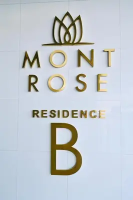a sign for the maureen rynes reference building at Fully Furnished 1BR In Montrose Tower B Dubai, Close by Dubai Science Park, Dubai Miracle Garden, Dubai Hills Mall in Dubai