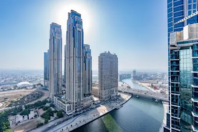 an aerial view of a city with tall buildings at Luxury 1 & 2 BHK Apartments, Branded & State of The Art Amenities in Dubai