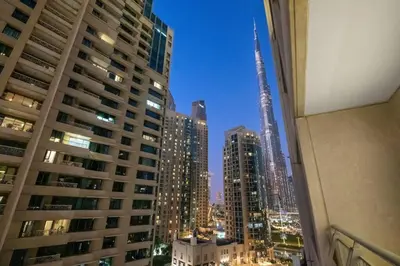a view of a city skyline with the spire at FIRST CLASS 2BR Incredible Burj Khalifa View in Dubai