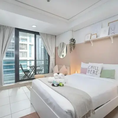 Waves - Cozy Studio with Balcony & Partial Lake Views