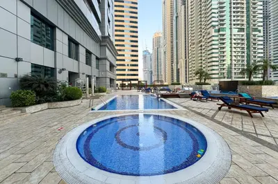 a large swimming pool in the middle of a building at Dubai Marina FLOOR 89 - AMAZING VIEWS in Dubai