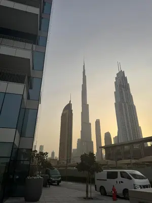 a view of a city skyline with skyscrapers at INA HOMES - 1BHK Downtown Views Direct Access to Dubai Mall in Dubai