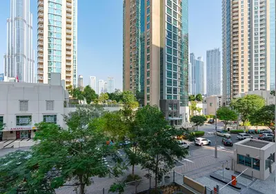 a view of a city with tall buildings at Luxurious 2-bedroom Apartment in Downtown with Burj Khalifa View in Dubai