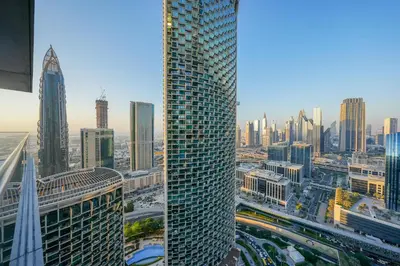 a view of a city with a tall building at 3 BHK Luxury Living at The Address Opera in Dubai