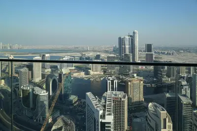 an aerial view of a city with tall buildings at Stunning 2BR Apt Burj Royale 10 mins walk to Dubai mall in Dubai