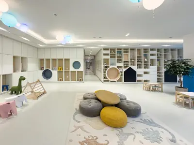 a large room with furniture and a room with a rug at Premium 1 BDR, In Burj Khalifa Park, Dubai Mall Walking Distance , Opera House 1mn away in Dubai